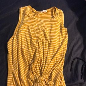 yellow sleeveless shirt